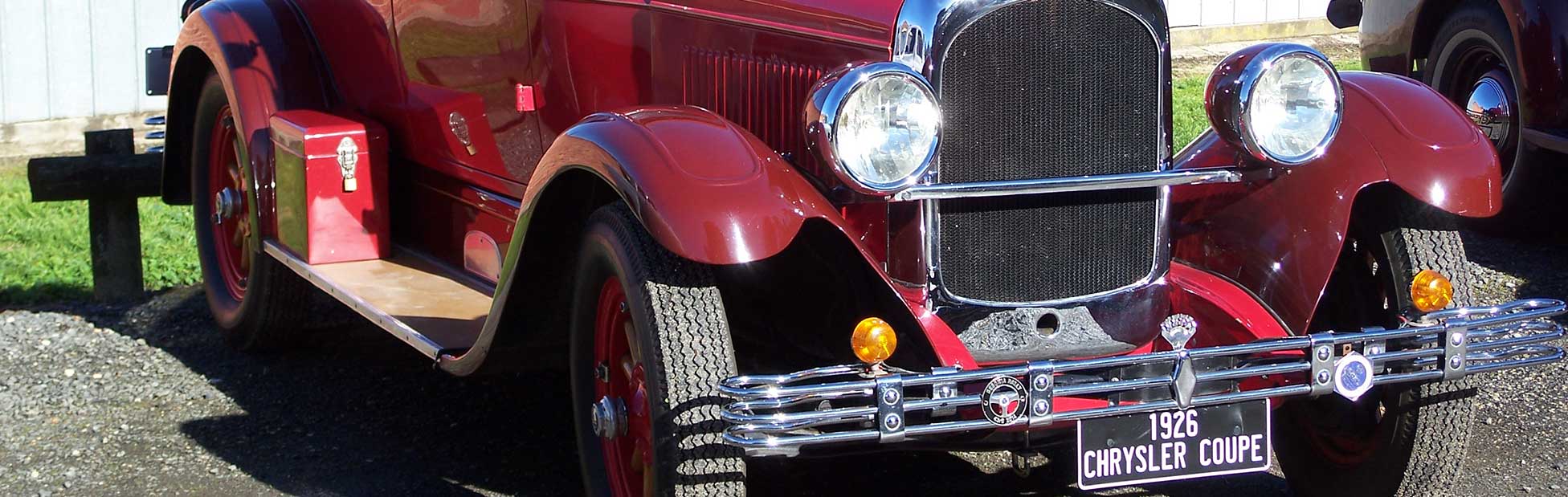 Red vintage car on display