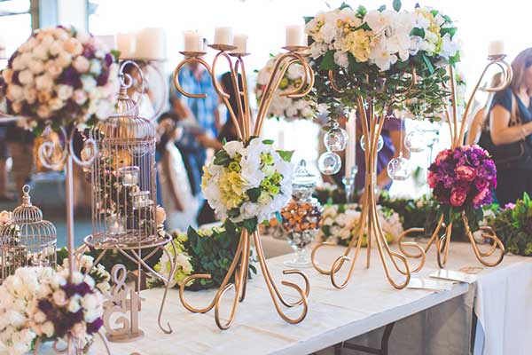 Table filled with wedding decoration examples