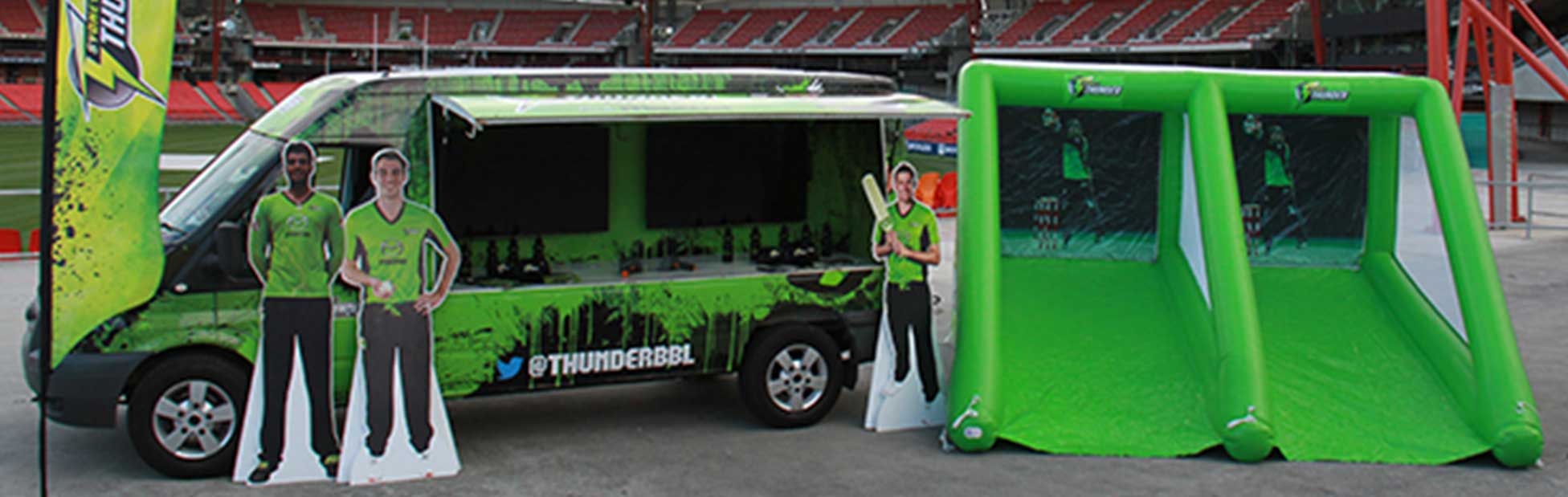 Sydney Thunder bright green van and slide