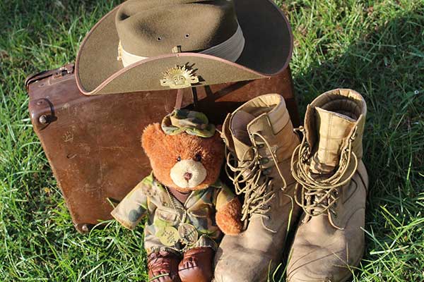 Army hat, boots and bear