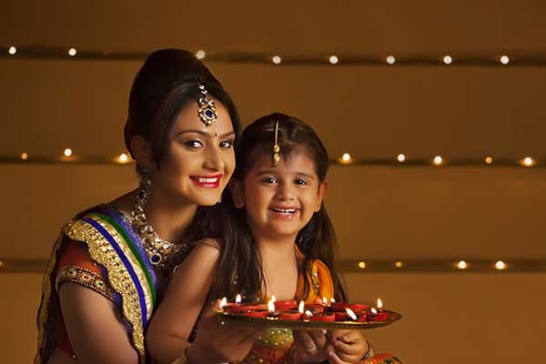 Woman and girl in traditional hindu costume