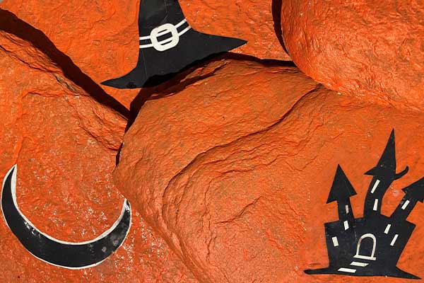 Orange Halloween style painted rocks