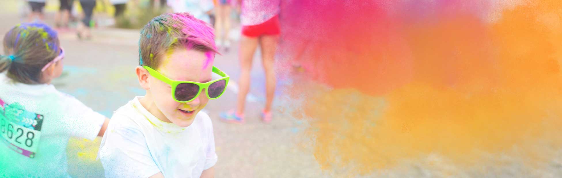 Boy doing colour run