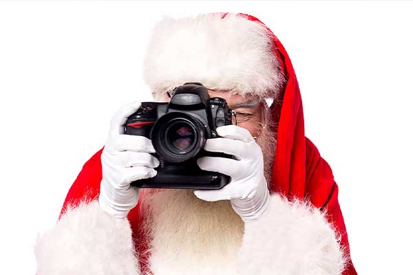 Santa’s Magical Visit to Panthers Santa taking photo with Camera