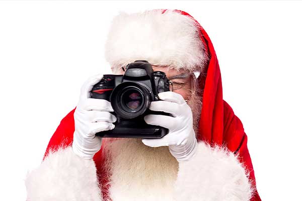 Santa taking photo with Camera