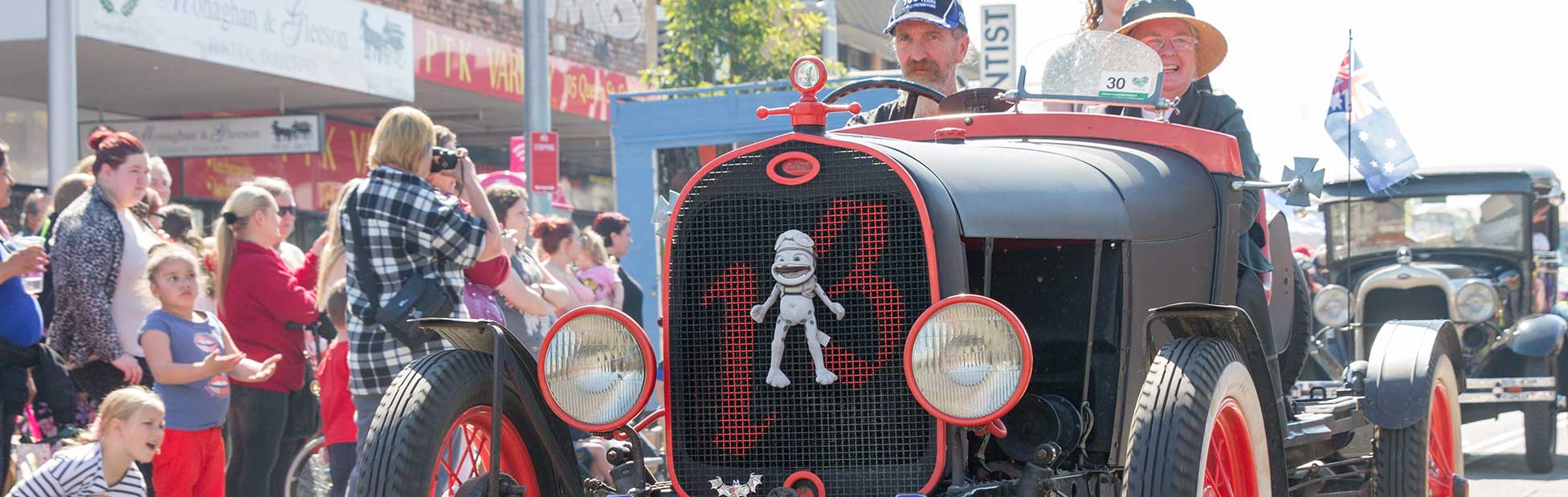 Historic black car in grand parade