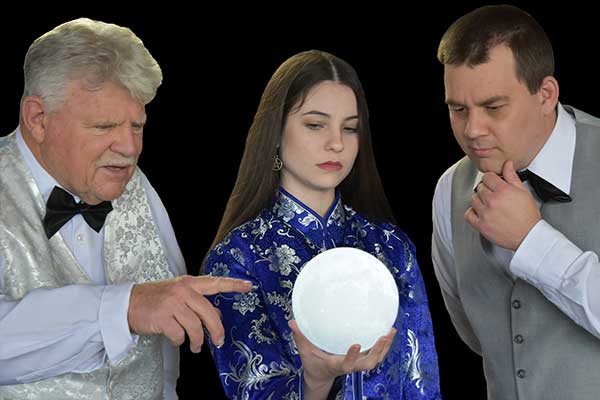 actors looking at crystal ball