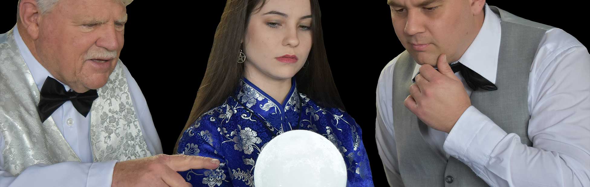 actors looking at crystal ball
