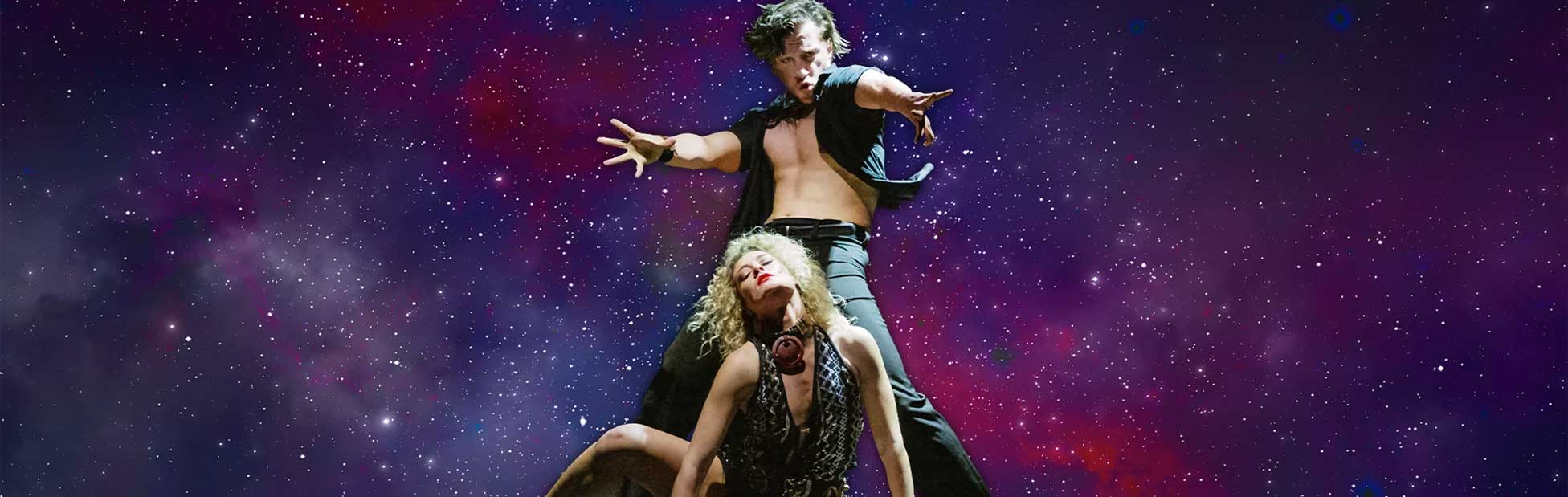 dancers in purple light