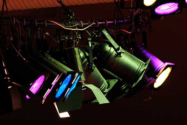Coloured spotlights above stage