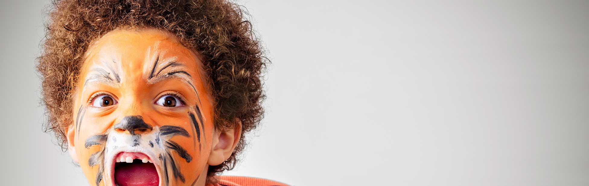 Boy with tiger facepaint
