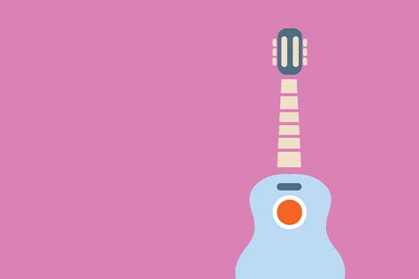 Guitar on pink background