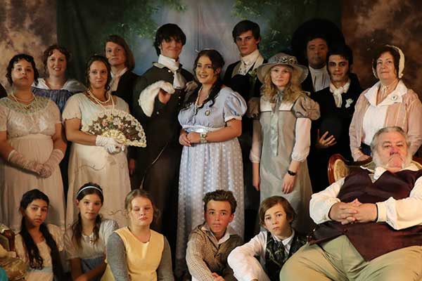 Cast of Mansfield Park posing for photo wearing old fashioned clothing