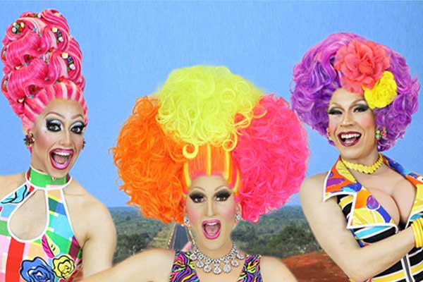 Three very colourful drag queens