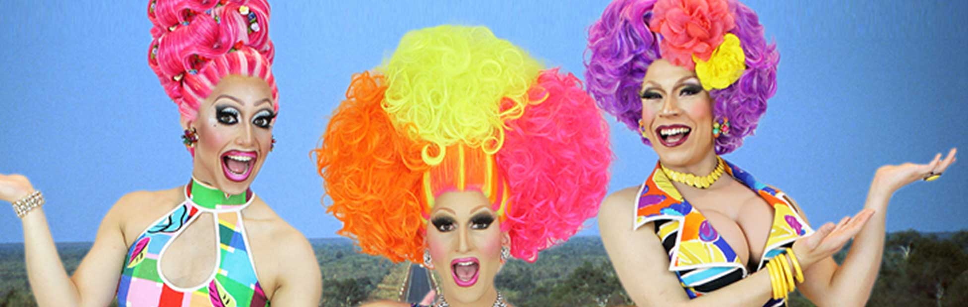 Three very colourful drag queens