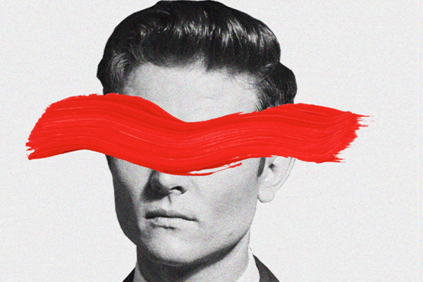 Man with eyes covered