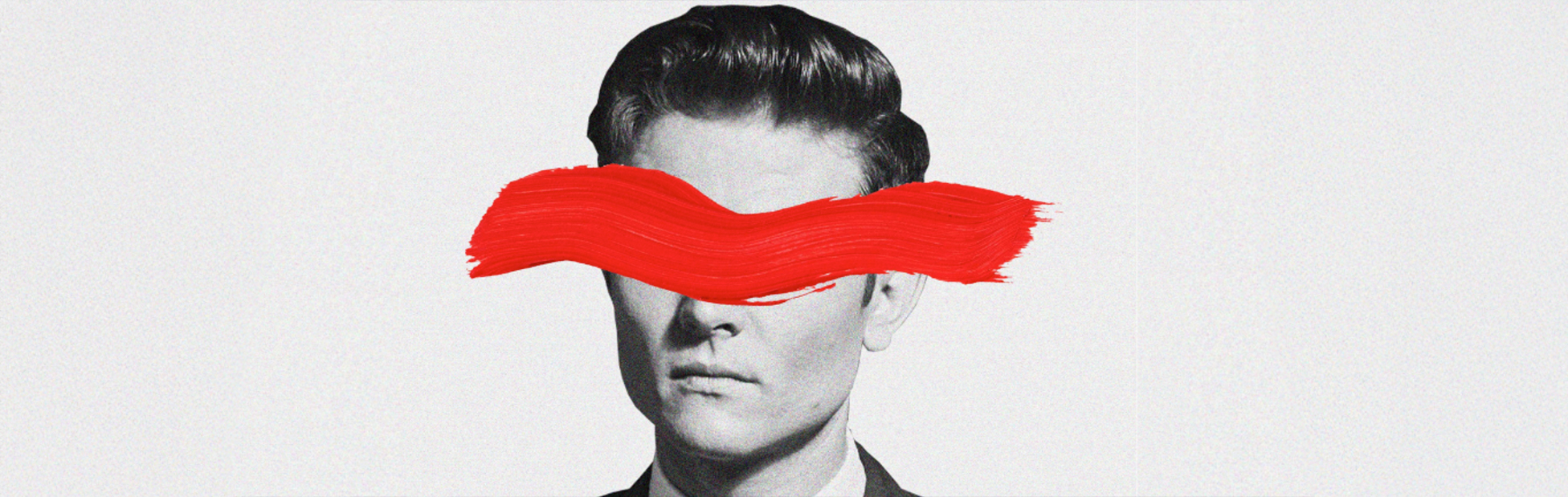 Man with eyes covered