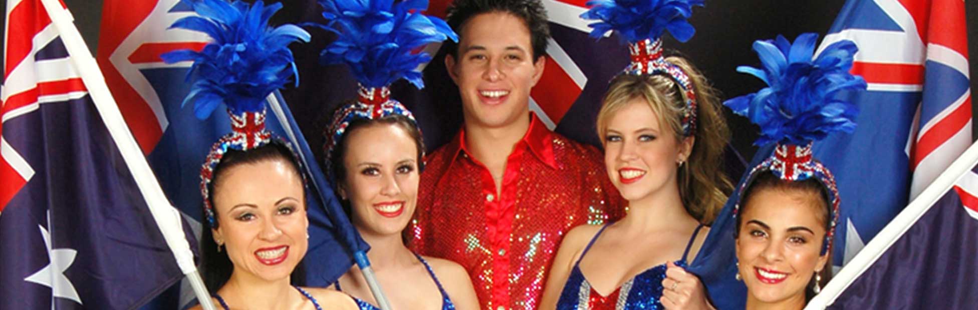 Performers surrounded by Australian flags