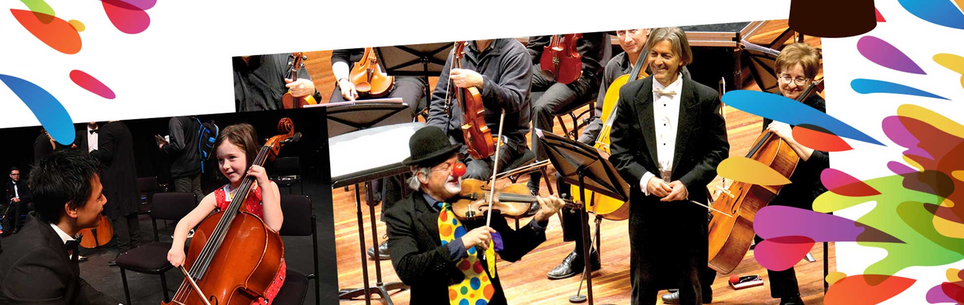 Clown playing violin with conductor watching and smiling