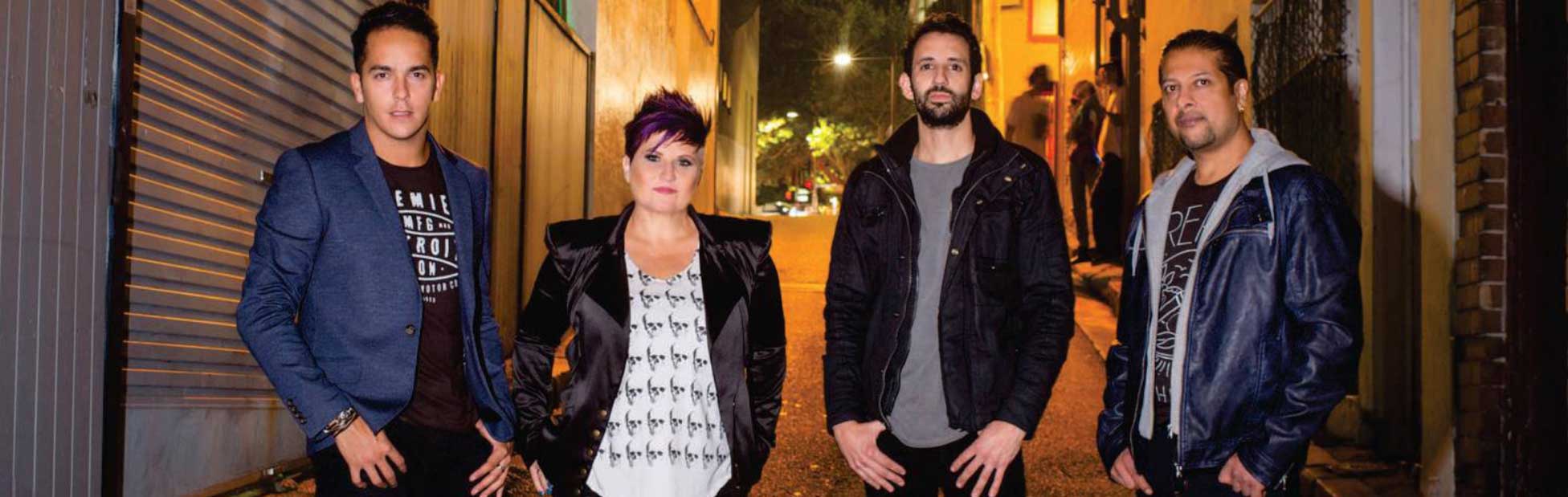 Urban Stone band posing in street alley