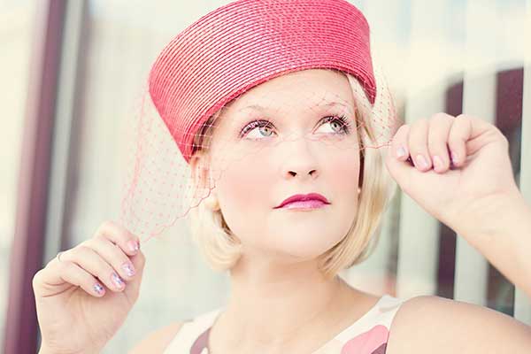 Woman wearing pink hat