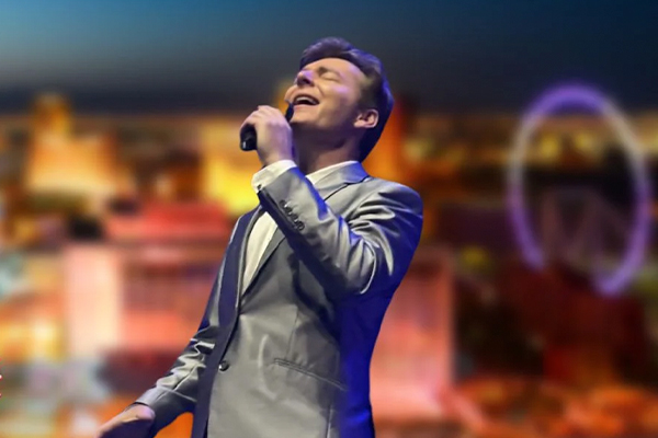 man singing near Vegas sign