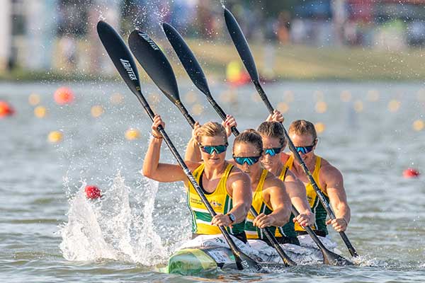 women in race on water