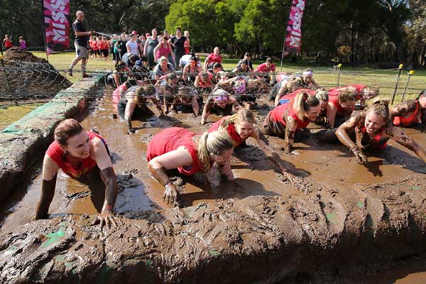 Females running through mud