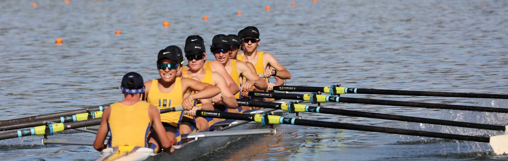 Male rowers on water at SIRC