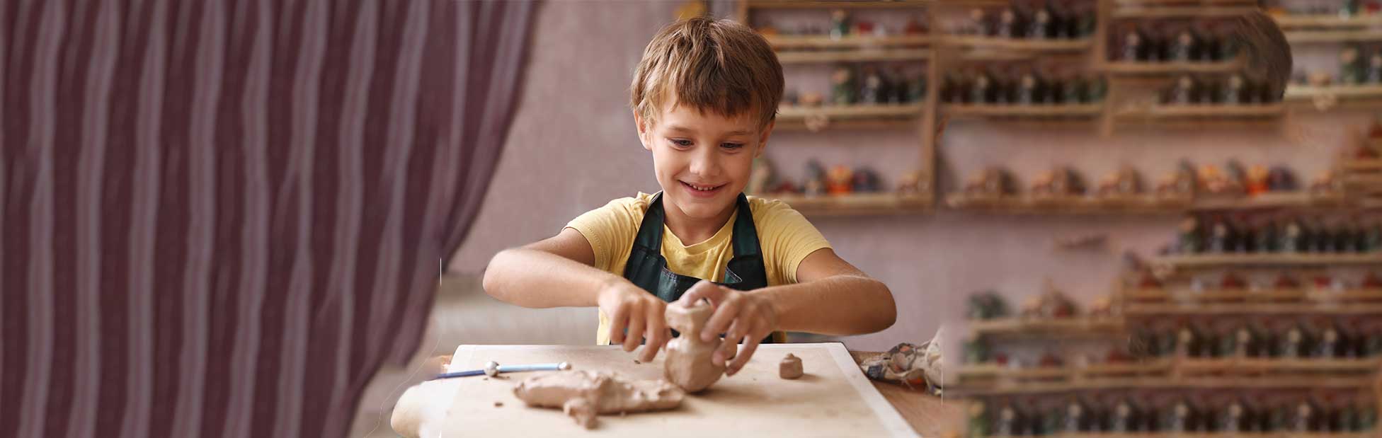 Child playing with clay
