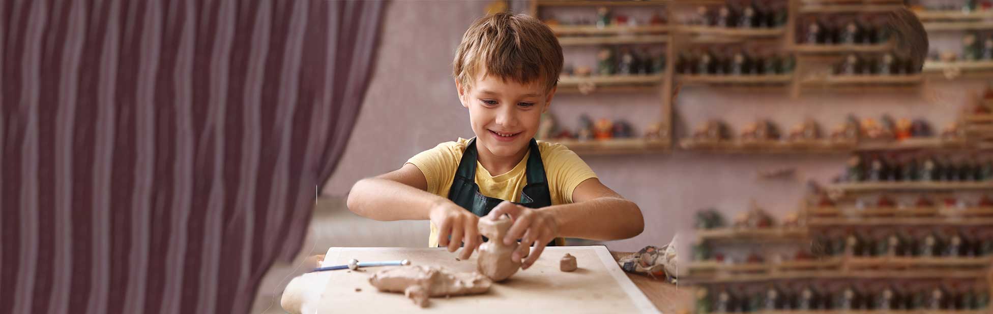 Child playing with clay