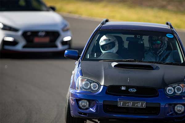 Line up of cars on Racetrack