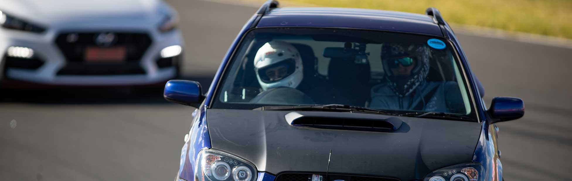 Line up of cars on Racetrack
