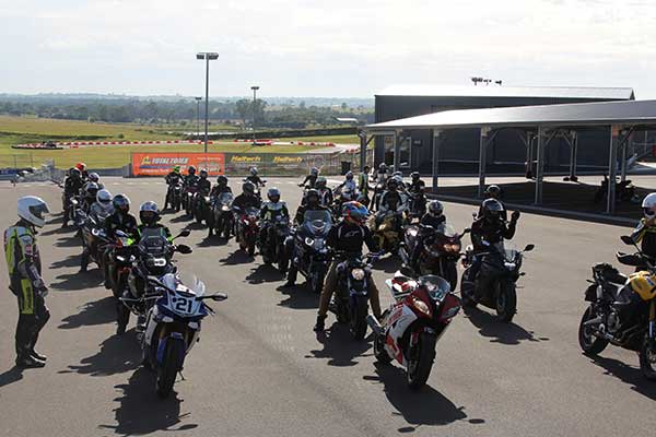 Group of motorcyclists on the racetrack