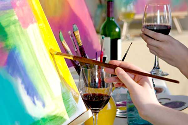 painting being painted wine glasses full