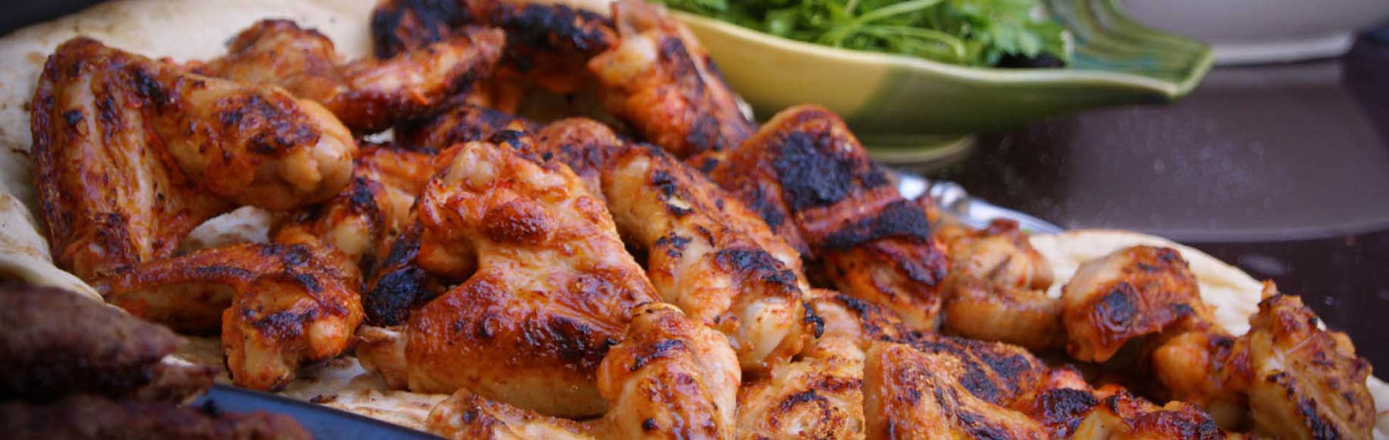 Charcoal chicken on a serving dish