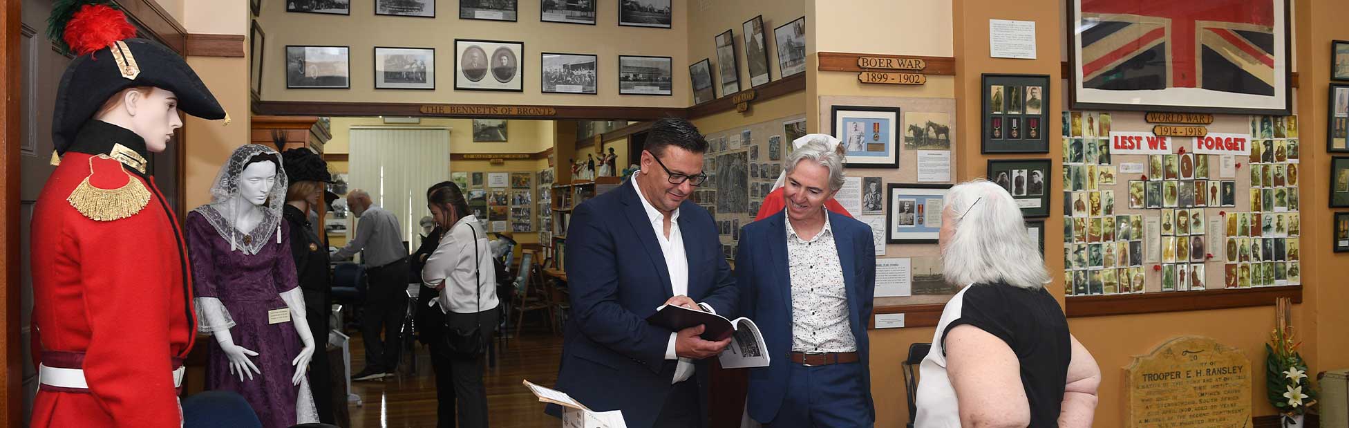 People looking at history displays