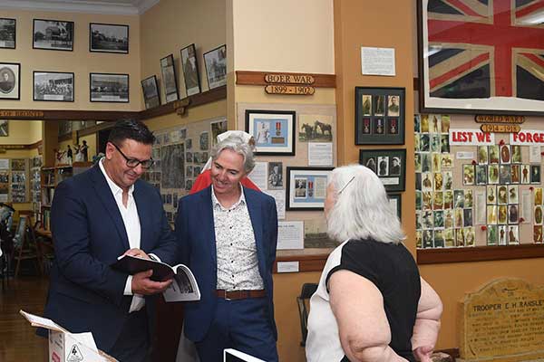 People looking at history displays