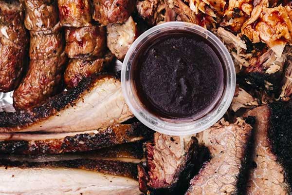 Meat and cup of sauce