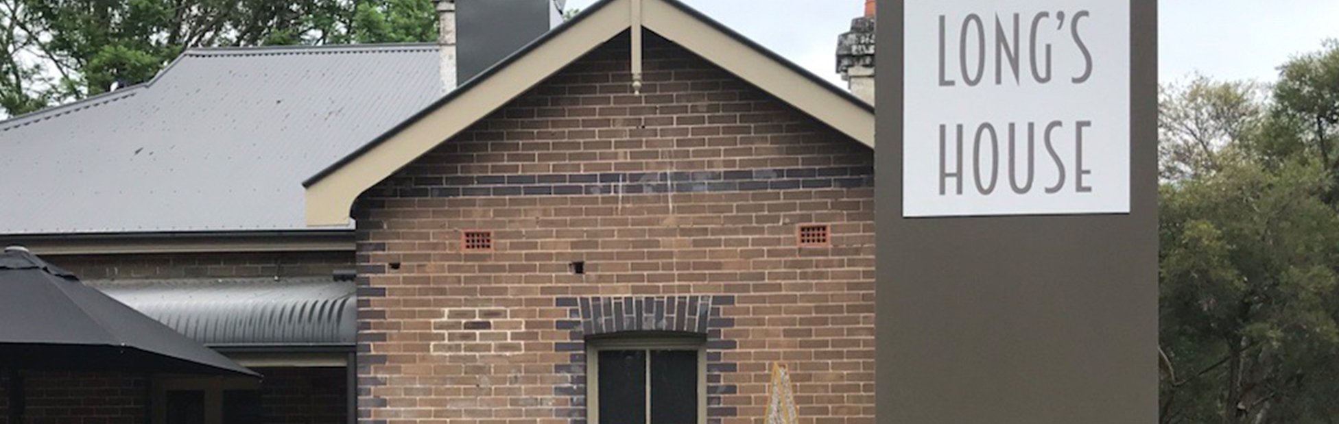 Longs house historic brick building frontage