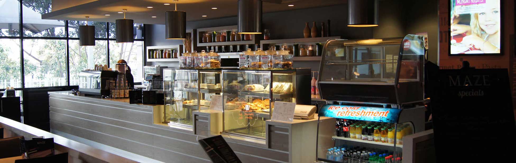 The counter at the Penrith RSL with cofee making machine, cake window and drink fridge