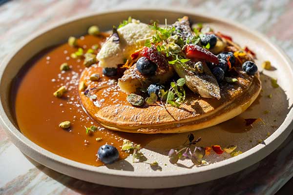 Pancake dressed with fresh berries