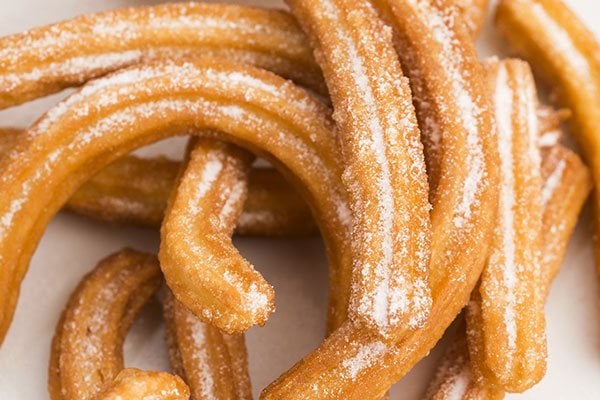 Close up of sugar dusted churros