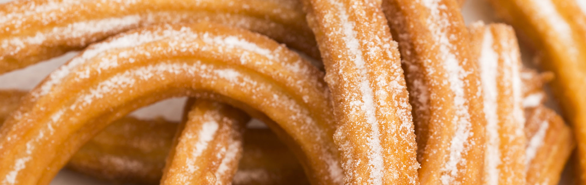 Close up of sugar dusted churros