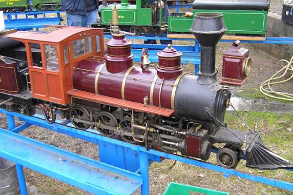 Model trains going around on a track